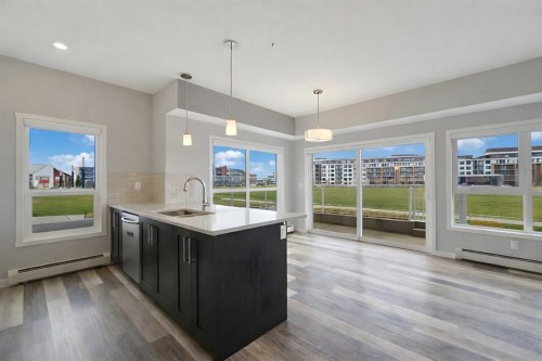 109-4150 Seton Drive Se, Calgary, AB - Indoor Photo Showing Kitchen