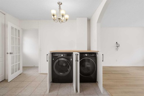 268 Madeira Place Ne, Calgary, AB - Indoor Photo Showing Laundry Room