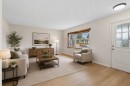 268 Madeira Place Ne, Calgary, AB  - Indoor Photo Showing Living Room 