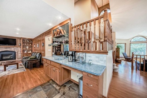 29 Deer River Green Se, Calgary, AB - Indoor Photo Showing Other Room With Fireplace