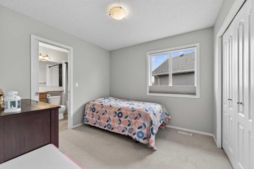 78 Cranberry Close Se, Calgary, AB - Indoor Photo Showing Bedroom