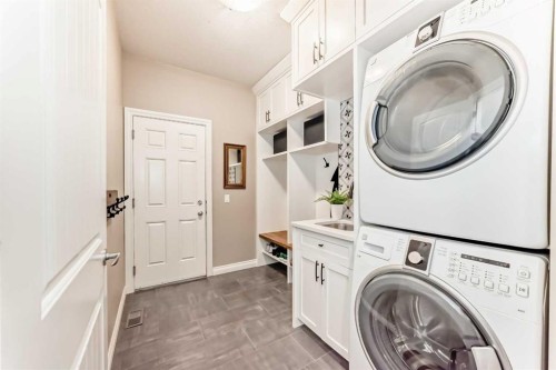 127 Cimarron Park Circle, Okotoks, AB - Indoor Photo Showing Laundry Room
