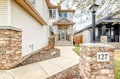 127 Cimarron Park Circle, Okotoks, AB - Outdoor With Facade