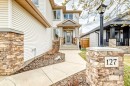 127 Cimarron Park Circle, Okotoks, AB  - Outdoor With Facade 