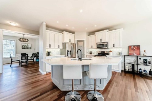 127 Cimarron Park Circle, Okotoks, AB - Indoor Photo Showing Kitchen With Stainless Steel Kitchen With Upgraded Kitchen