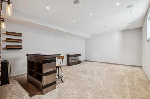 2011 48 Avenue Sw, Calgary, AB - Indoor Photo Showing Other Room With Fireplace