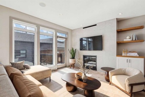 2011 48 Avenue Sw, Calgary, AB - Indoor Photo Showing Living Room With Fireplace