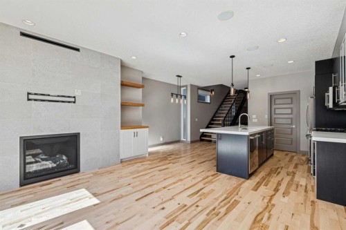 2011 48 Avenue Sw, Calgary, AB - Indoor With Fireplace