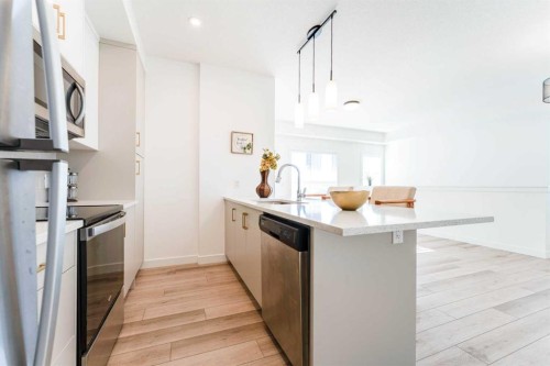 120 Spring Creek Common Sw, Calgary, AB - Indoor Photo Showing Kitchen With Upgraded Kitchen