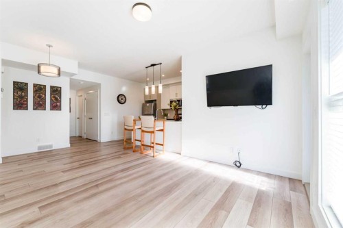 120 Spring Creek Common Sw, Calgary, AB - Indoor Photo Showing Living Room