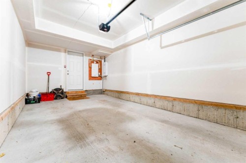 120 Spring Creek Common Sw, Calgary, AB - Indoor Photo Showing Garage