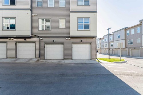 120 Spring Creek Common Sw, Calgary, AB - Outdoor With Facade