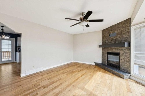 201 Southridge Place, Didsbury, AB - Indoor With Fireplace