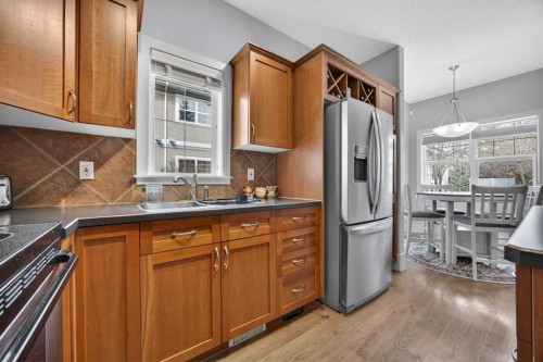 83 Wentworth Common Sw, Calgary, AB - Indoor Photo Showing Kitchen With Double Sink