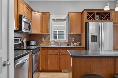 83 Wentworth Common Sw, Calgary, AB - Indoor Photo Showing Kitchen With Double Sink