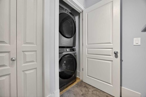83 Wentworth Common Sw, Calgary, AB - Indoor Photo Showing Laundry Room