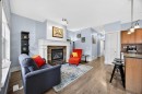 83 Wentworth Common Sw, Calgary, AB  - Indoor Photo Showing Living Room With Fireplace 