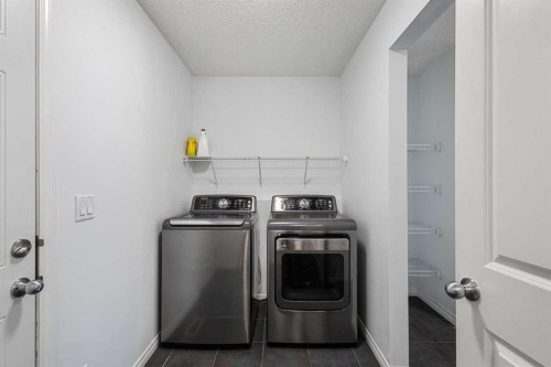 72 Pantego Close Nw, Calgary, AB - Indoor Photo Showing Laundry Room