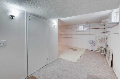 2318 Bowness Road Nw, Calgary, AB - Indoor Photo Showing Other Room