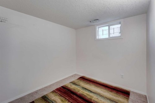 2318 Bowness Road Nw, Calgary, AB - Indoor Photo Showing Other Room