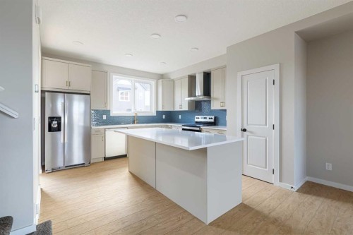  - Indoor Photo Showing Kitchen With Double Sink