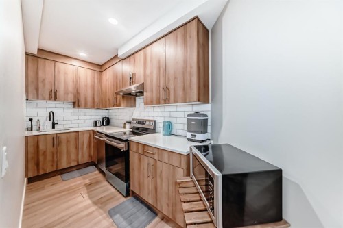 193 Kinniburgh Circle, Chestermere, AB - Indoor Photo Showing Kitchen With Upgraded Kitchen