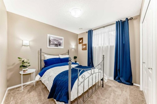182 Chapalina Close Se, Calgary, AB - Indoor Photo Showing Bedroom