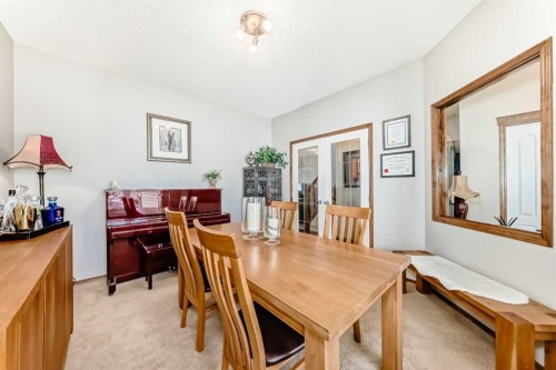 182 Chapalina Close Se, Calgary, AB - Indoor Photo Showing Dining Room