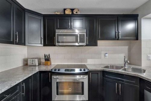 72 Cityscape Row Ne, Calgary, AB - Indoor Photo Showing Kitchen With Stainless Steel Kitchen With Double Sink With Upgraded Kitchen