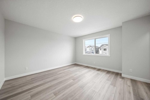 46 Versant View Sw, Calgary, AB - Indoor Photo Showing Other Room