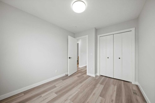 46 Versant View Sw, Calgary, AB - Indoor Photo Showing Other Room
