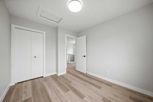 46 Versant View Sw, Calgary, AB - Indoor Photo Showing Other Room