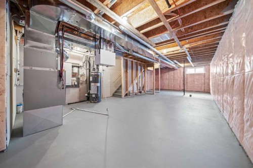 46 Versant View Sw, Calgary, AB - Indoor Photo Showing Basement