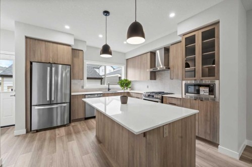 46 Versant View Sw, Calgary, AB - Indoor Photo Showing Kitchen With Stainless Steel Kitchen With Upgraded Kitchen