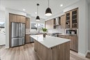 46 Versant View Sw, Calgary, AB  - Indoor Photo Showing Kitchen With Stainless Steel Kitchen With Upgraded Kitchen 