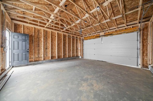 46 Versant View Sw, Calgary, AB - Indoor Photo Showing Garage