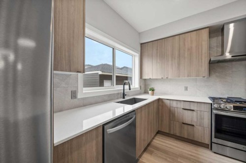 46 Versant View Sw, Calgary, AB - Indoor Photo Showing Kitchen With Stainless Steel Kitchen With Upgraded Kitchen