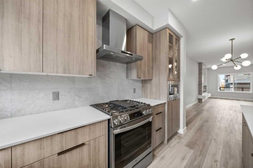 46 Versant View Sw, Calgary, AB - Indoor Photo Showing Kitchen With Upgraded Kitchen