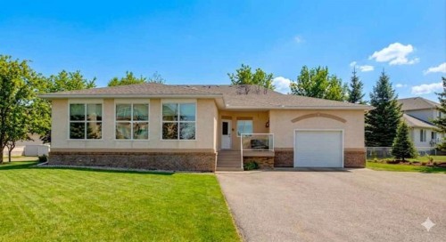 7-43 Westlake Circle, Strathmore, AB - Outdoor With Facade