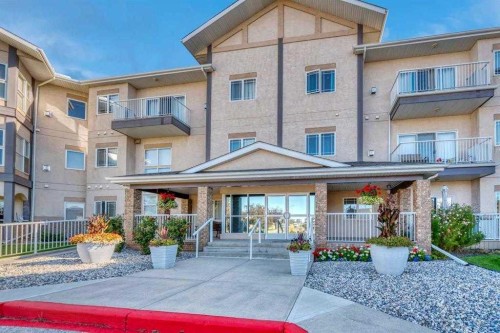 7-43 Westlake Circle, Strathmore, AB - Outdoor With Facade