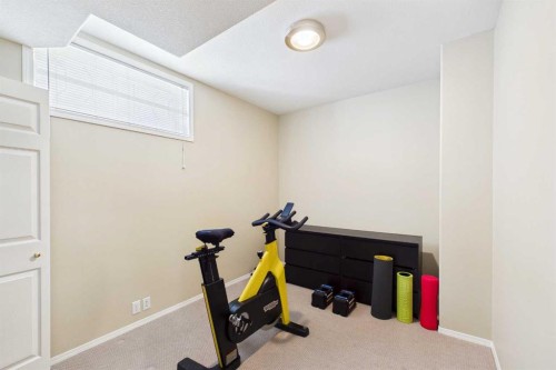 62 Tuscany Hills Park Nw, Calgary, AB - Indoor Photo Showing Gym Room