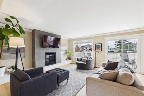 62 Tuscany Hills Park Nw, Calgary, AB - Indoor Photo Showing Living Room With Fireplace