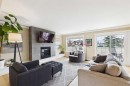 62 Tuscany Hills Park Nw, Calgary, AB  - Indoor Photo Showing Living Room With Fireplace 