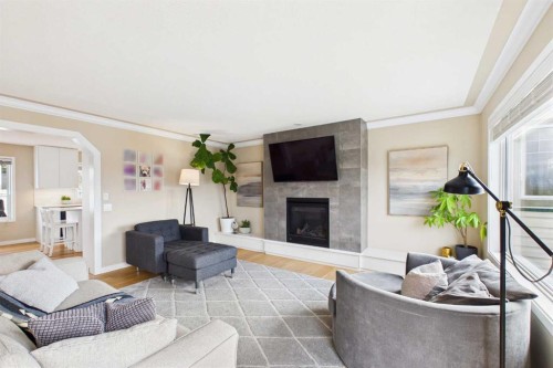 62 Tuscany Hills Park Nw, Calgary, AB - Indoor Photo Showing Living Room With Fireplace