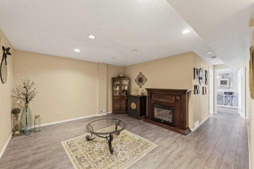 24 Deer Ridge Close Se, Calgary, AB - Indoor With Fireplace