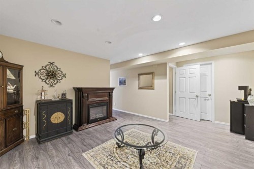 24 Deer Ridge Close Se, Calgary, AB - Indoor With Fireplace