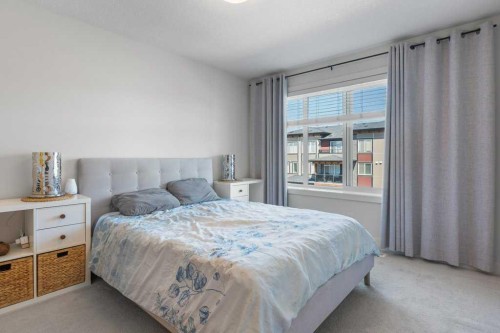 222 Seton Passage Se, Calgary, AB - Indoor Photo Showing Bedroom