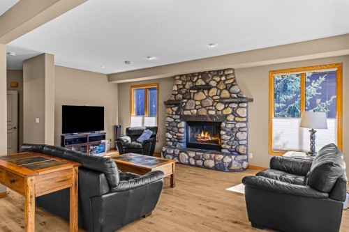 389 Eagle Heights, Canmore, AB - Indoor Photo Showing Living Room With Fireplace