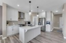 521 Corner Meadows Way Ne, Calgary, AB  - Indoor Photo Showing Kitchen With Stainless Steel Kitchen With Double Sink With Upgraded Kitchen 