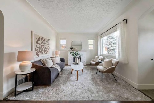711 14A Street Se, Calgary, AB - Indoor Photo Showing Living Room
